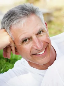 Older man shows off his tooth implant in Gibsonton.