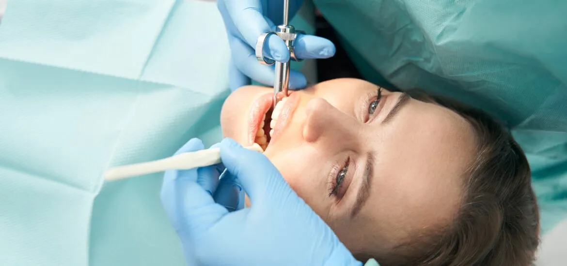 Woman receiving dental treatment, sedation for anxiety